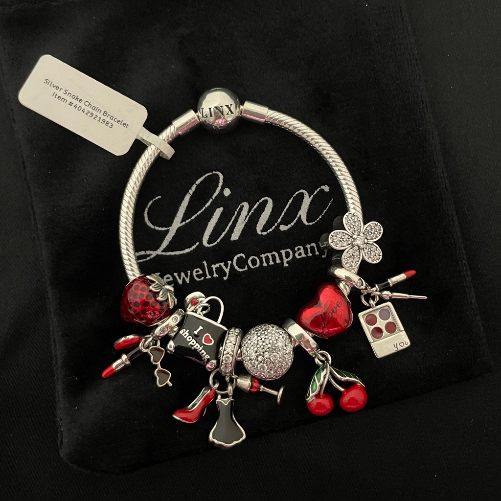 Linx Snake Chain Bracelet With Red And Black Themed Charms 219$